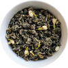 Loose jasmine flower green tea — dried jasmine blossoms blended with fragrant green tea leaves Herbal Monkey
