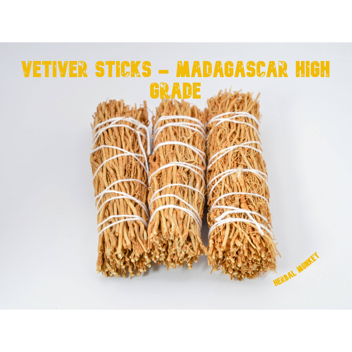 Three Madagascar high grade Vetiver smudge sticks made from golden dried vetiver roots, hand tied with white cotton string