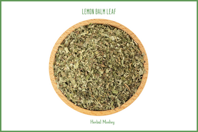 Coarse‑cut dried Lemon Balm leaf — bright green aromatic herb suitable for tea, ritual craft, and traditional use